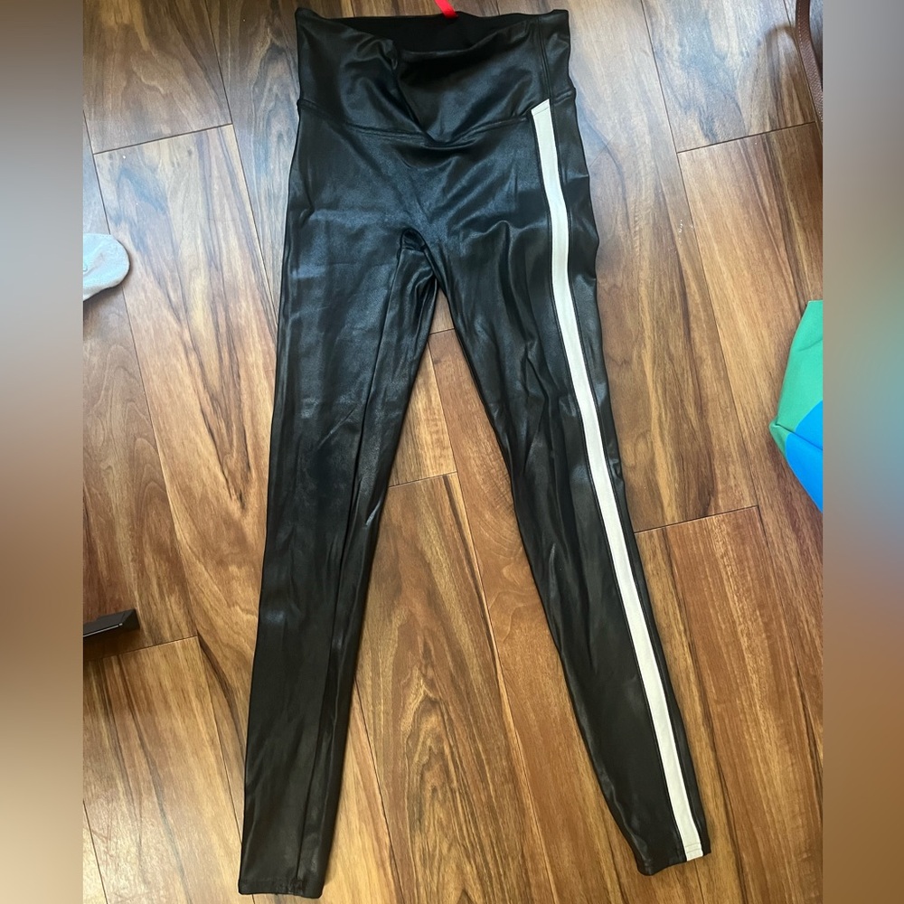 Spanx black faux leather leggings with side stripe on both side sz S